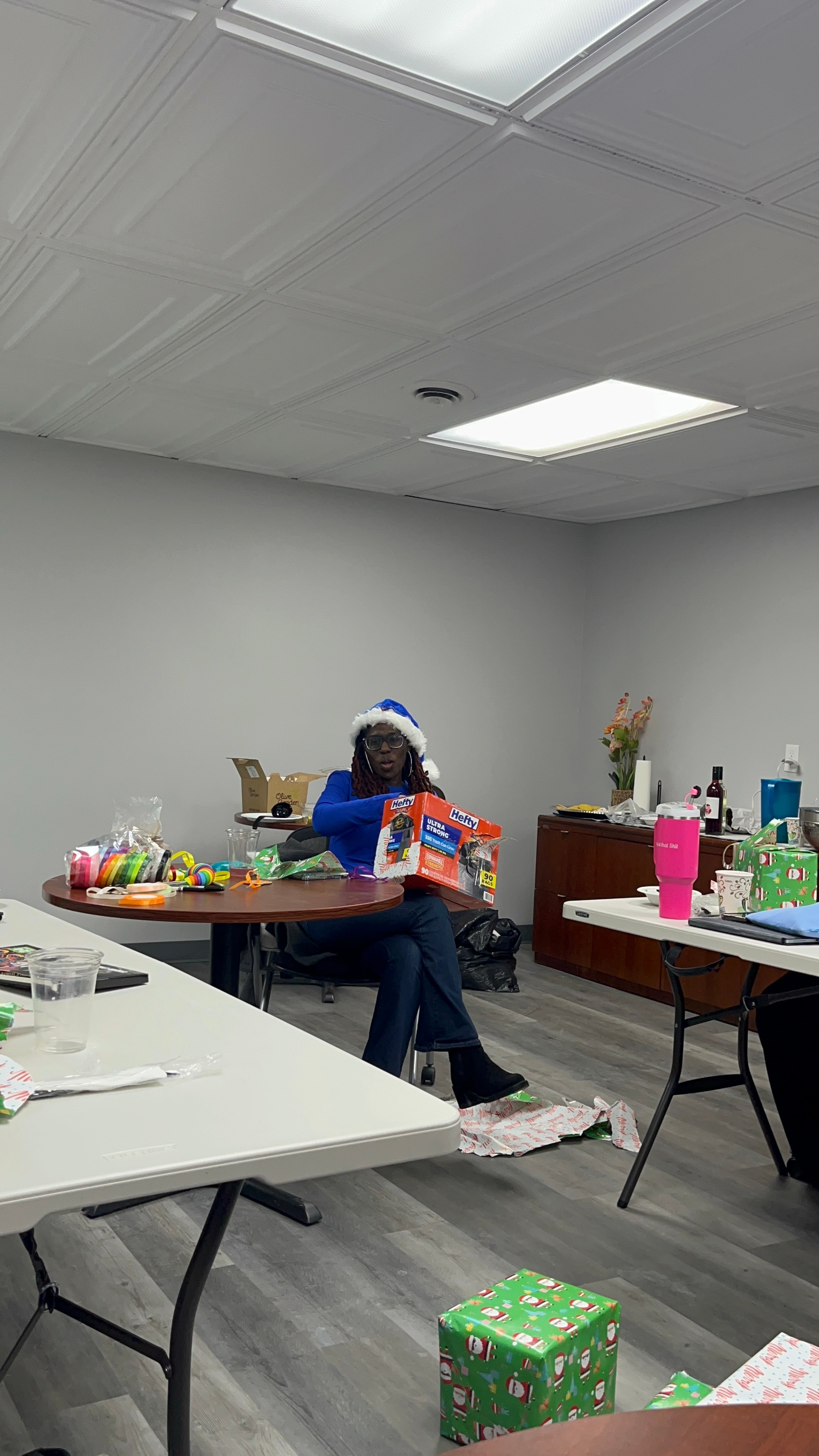 Changes Therapeutic Services team member preparing holiday supplies for the community