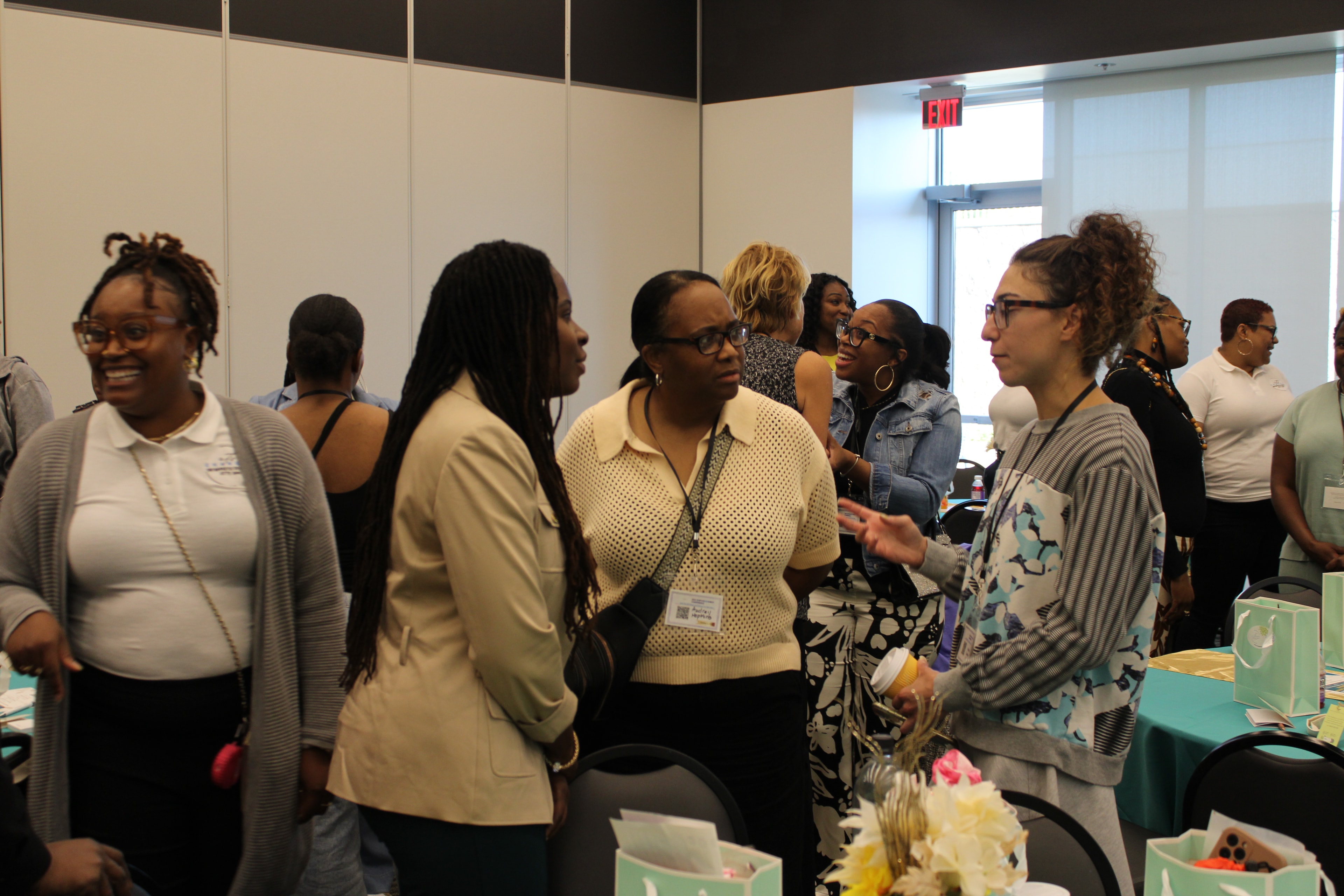 Attendees talking together during a Changes Therapeutic Services event