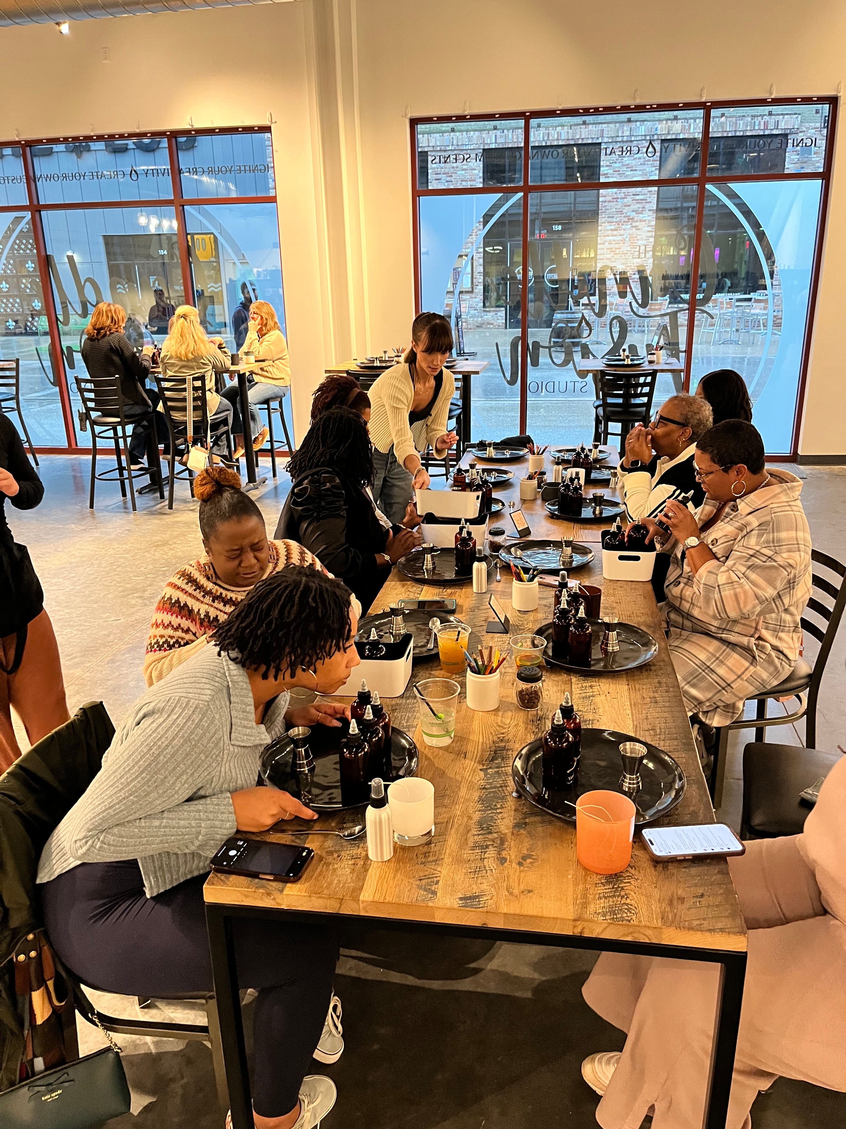 Participants gathered around a table during a Changes Therapeutic Services workshop activity